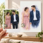 Cuplul la nuntă: poza ca polaroid, în mână, și tabloul lor (tablou în acuarelă) pe perete