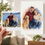 Cuplul cu câinele, la lac: poza ca polaroid, în mână, și tabloul lor (tablou în acuarelă) pe perete
